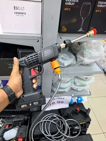 cordless pressure washer / portable high-pressure water spray gun, with a foam/spray nozzle and a ba
