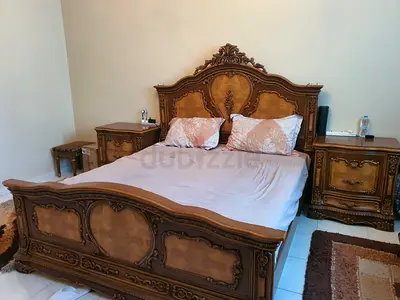 Classic Ornate Bedroom Set with, Nightstands, Mirror, and seats