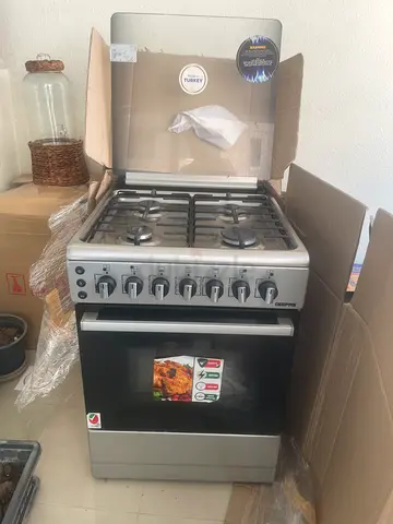 Gas stove with cylinder