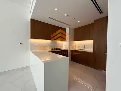 2br open kitchen next to metro poolfacing