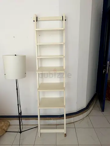 White shelf could be used for books or shoes too