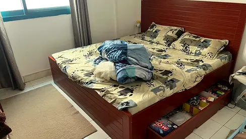 Wooden double bed with under-bed drawers - good condition