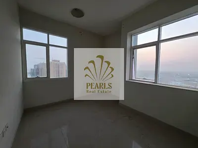 Two-bedroom apartment available for annual rent in Emirates City, Ajman, located within Emirates City Towers. The apartment consists of two bedrooms