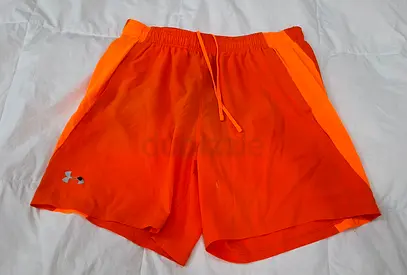 Under Armour men's orange athletic shorts - size L (good condition)