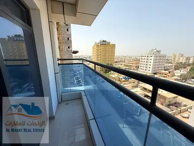A two-bedroom apartment with a living room and two bathrooms is now available for annual rent in the Al Nuaimiya 1 area, next to Al Ain Hotel and very