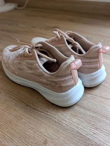 These appear to be a pair of pink RBX Women Lace Up Training Shoes Size 38
