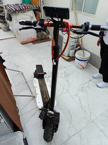 Used Off-road Electric Scooter with Suspension and Display - Good Condition