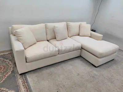 Expensive quality crate and barrel beige color lshape sofa