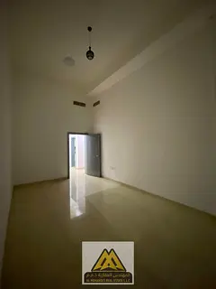 Annual Rent – 1BR & Living | Al Yasmeen, Ajman. Separate kitchen, 2 baths, spacious, balcony, and