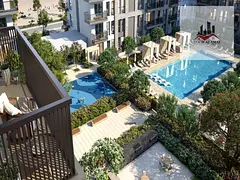 Located in Maryam Island, Al Mamzar, Sharjah, this spacious one-bedroom apartment (with a living roo