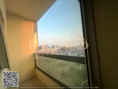 For annual rent in Ajman, Al Hamidiya – 2BR apartment, 3 bathrooms, balcony, near Ajman Court and
