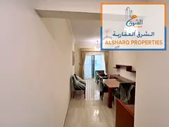 A newly furnished one-bedroom apartment with high-end finishes and a balcony in Al Jurf 2.