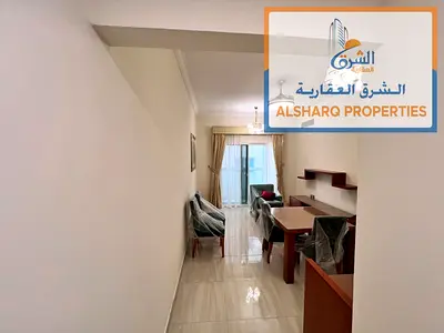 A newly furnished one-bedroom apartment with high-end finishes and a balcony in Al Jurf 2.