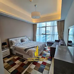 Luxury apartment, second occupancy, one bedroom, living room with open balcony. Ajman, Gulf Tower. F