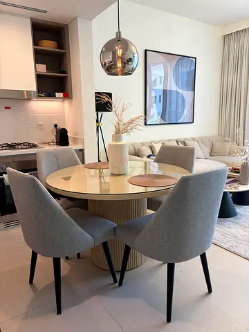 Dining table with 4 modern grey upholstered chairs
