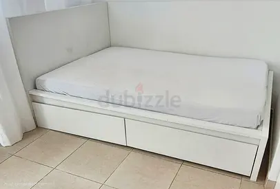 White single daybed with under-bed drawers