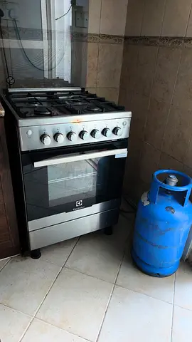Electrolux freestanding gas cooker with oven - good working condition including Gas cylinder