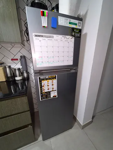 Silver double-door refrigerator - good condition