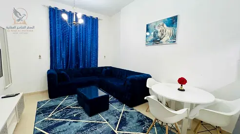 Special rental opportunity in Ajman furnished apartment in City Tower on Khalifa Street clean and tidy furniture two bathrooms balcony