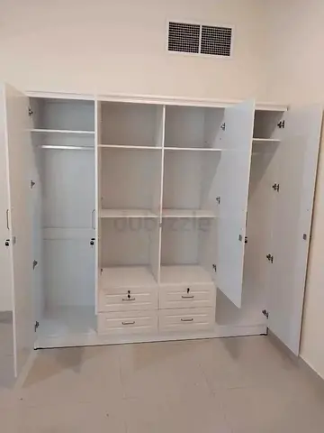 Brand new 4door wardrobe with drawer