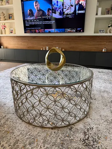 Round decorative metal and glass coffee table - elegant design