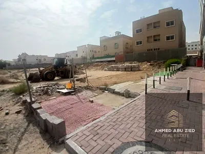 Residential and commercial land for sale in Al Mowaihat 1, Ajman - second plot from the street, 6,727 sqft, permit G+2, freehold for all nationalities