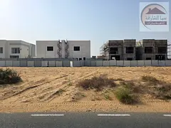 Land for sale in Sharjah, Al Hooshi commercial area, two streets (front and back), freehold ownershi