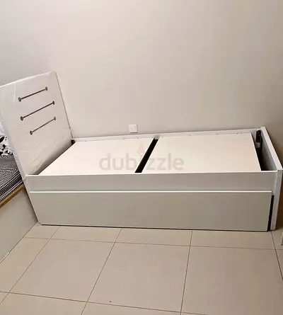 White single bed frame with built-in storage drawer