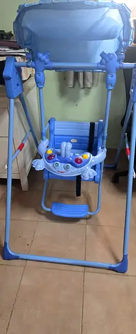 Light blue baby swing/seat with toy bar - good used condition