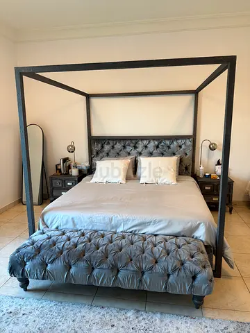 Four-poster tufted velvet king bed with bench, sturdy frame and two side tables
