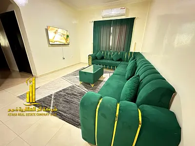 Luxury apartment, second occupancy. Two bedrooms, living room, and open balcony. Ajman, Al Muwaihat. Fully furnished for monthly rent.
