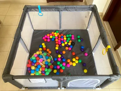 Playpen with multicolour balls for sale