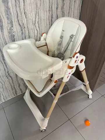 Adjustable Baby High Chair - Foldable, With Trays and Wheels