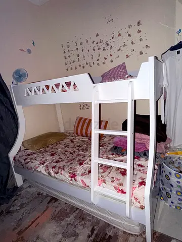 White wooden single bed frame with headboard and footboard - good condition