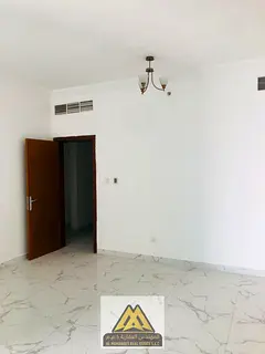 A distinctive, very spacious one-bedroom apartment with a living room in Al Waha Tower, offering a c