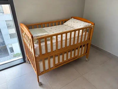 Lightwood Baby Crib with Mattress and Lower Storage Drawer - Good Condition