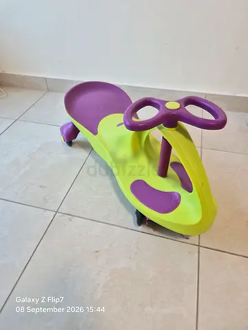 Kids Wiggle Ride-On Car (green & purple) - Good Used Condition