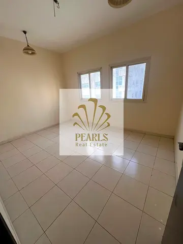 2-Bedroom Apartment for Annual Rent in Al Nuaimiya on King Faisal Street | 2 Bathrooms, Balcony & Central AC | AED 33,000