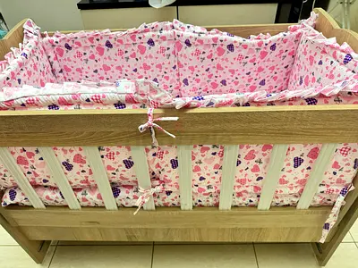 Brand new Baby crib/Baby Cot liner, soft foamy 4 sided liner.2 bedsheets.Cushion and pillow.