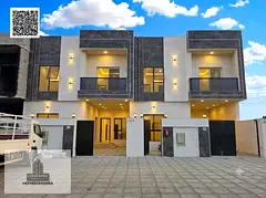 Villa for sale in Al Helio, Ajman: 4 master bedrooms, majlis, living room, and maid's room. Freehold
