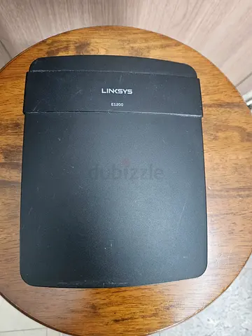 Linksys wireless router (used) - compact black unit