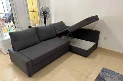 L-shaped Grey Fabric Sofa with Storage - Good Condition