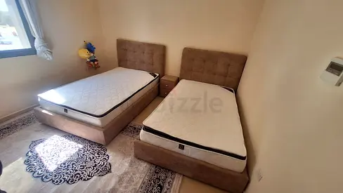 Selling Brand New two single bed with mattresses