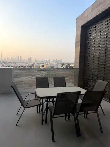 Outdoor patio dining table with 4 mesh chairs