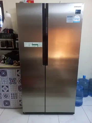 Samsung Stainless Steel Side-by-Side Refrigerator - Good Condition