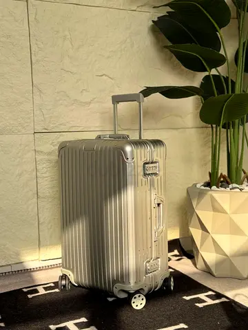 Rimowa carry silver aluminum body bag