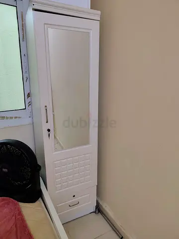 White freestanding wardrobe with mirror and drawers