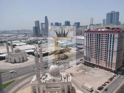 SPACIOUS BRIGHT APPARTMENT// EASY PAYMENT // FAMILY BULIDING // EASY CLOSE EXIT TO DUBAI