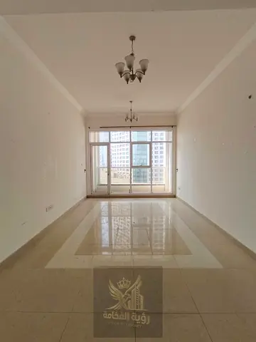Two bedroom apartment with living room and balcony in Al Majaz 2 with free parking prime location on Jamal Abdul Nasser Street directly next to the bu