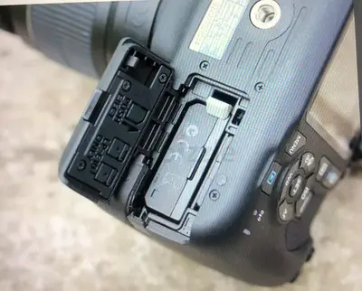 Used DSLR Camera Body (battery compartment shown) - Good Working Condition